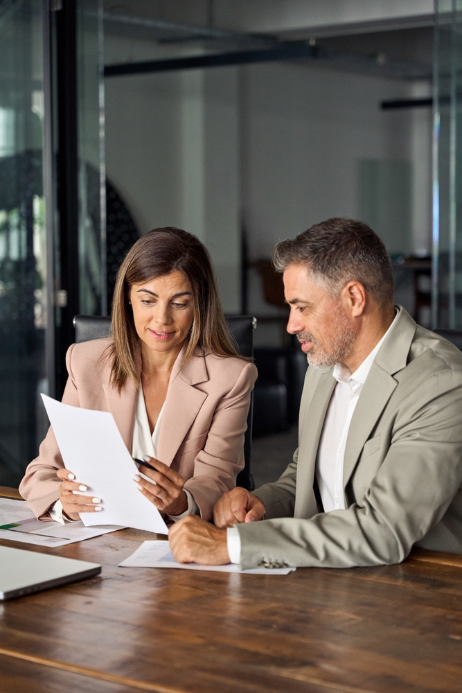 Boss discussing benefits with employee